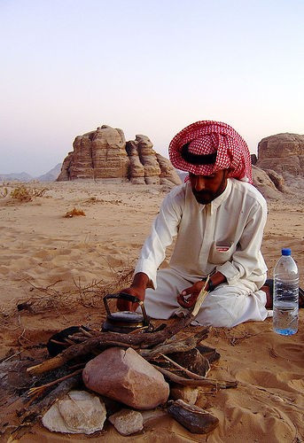 Beduin lighting a fire